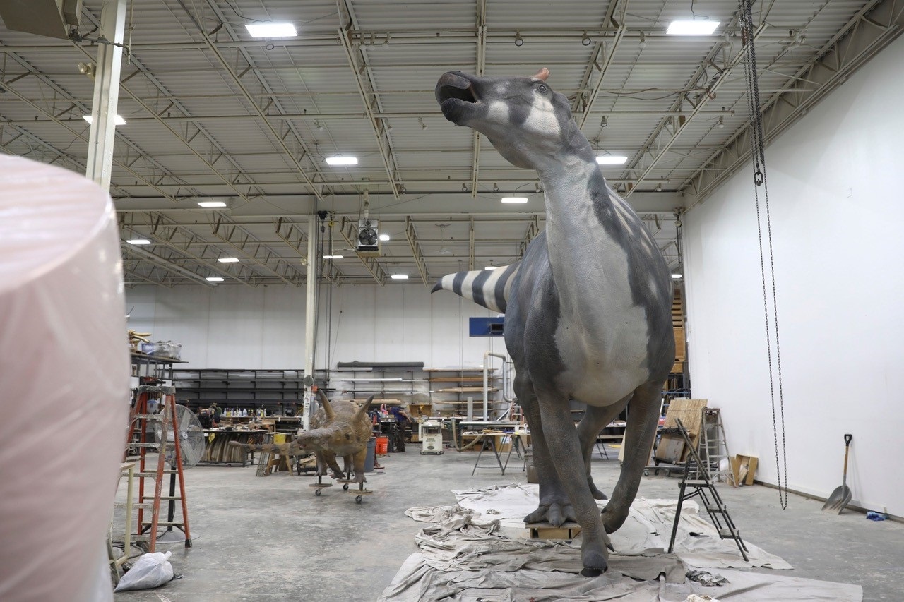 An in-progress dinosaur sculpture