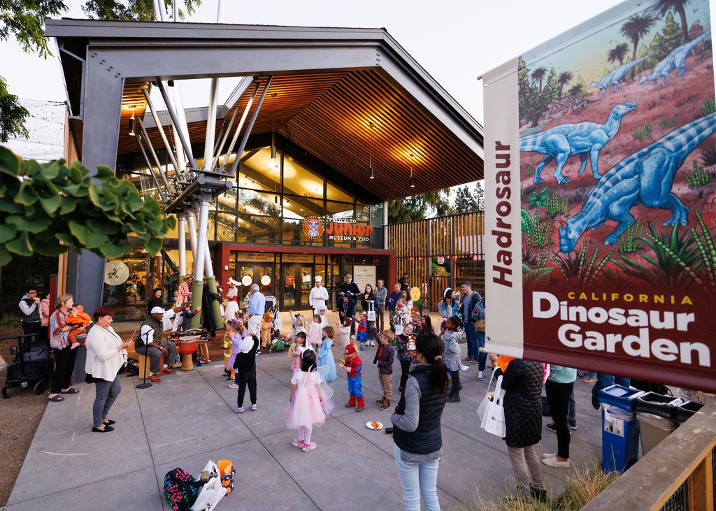 Families outside of the Junior Museum & Zoo during Halloween Zoo Night.