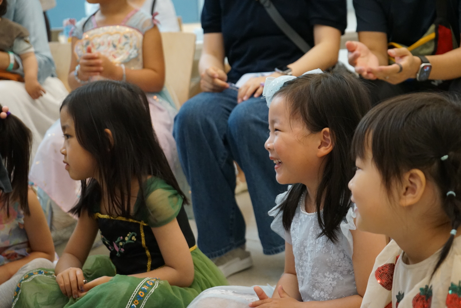 Two girls smiling at Zoo Animals program.
