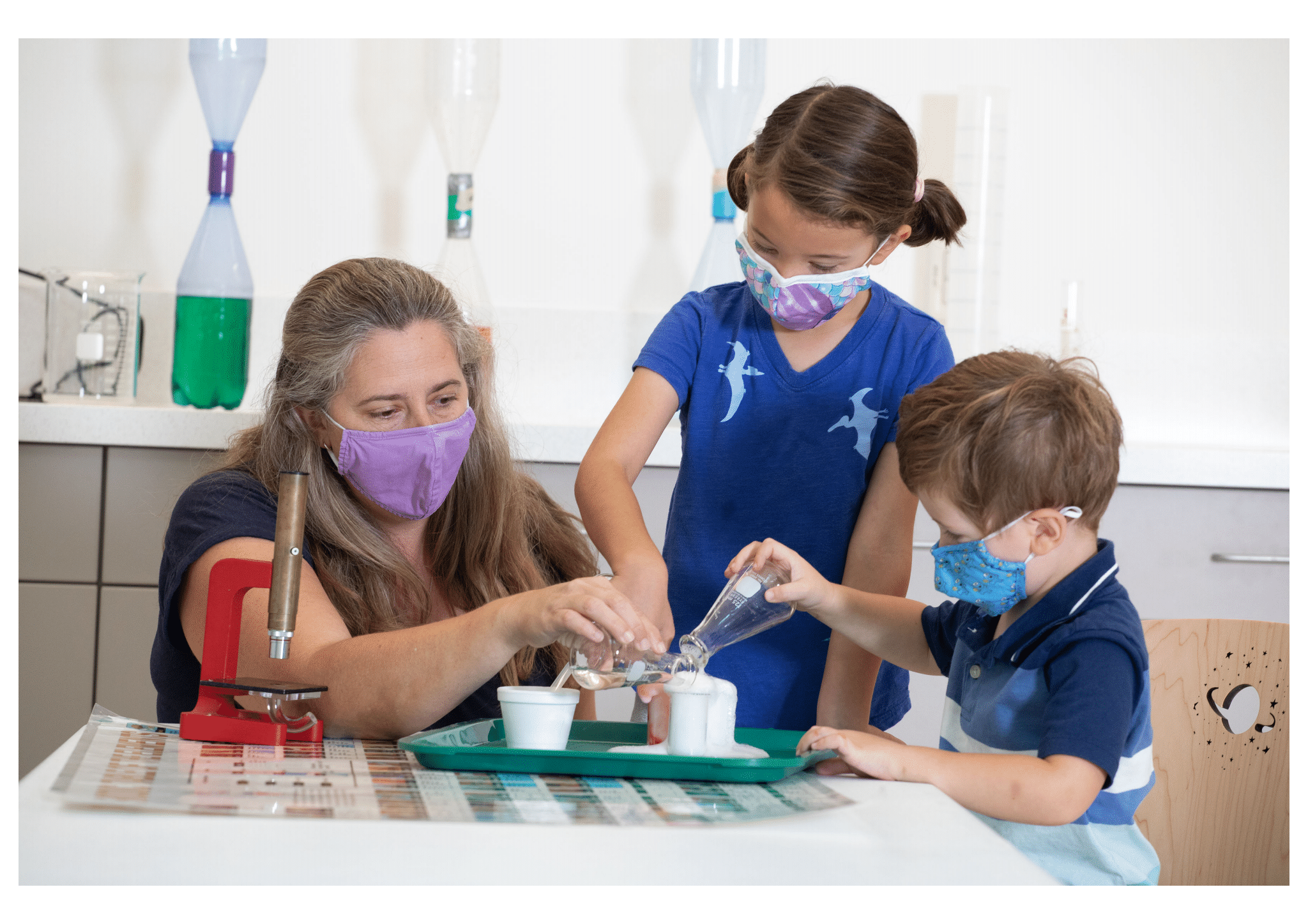 Science Program with Educator and Two Kids